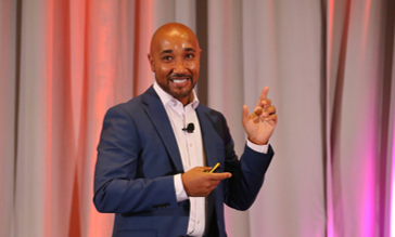 LMA26 speaking on stage